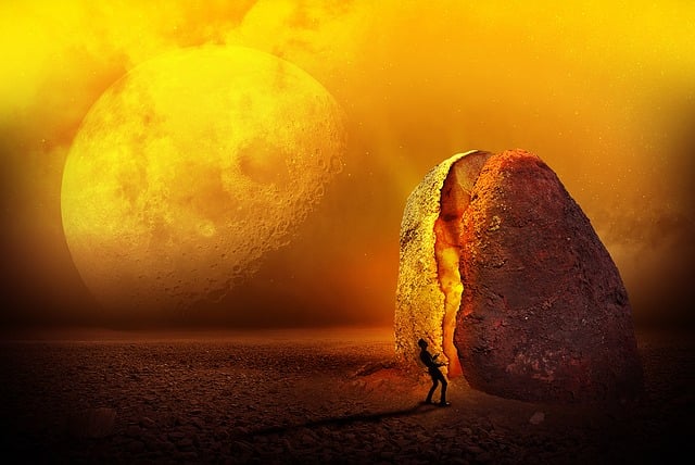 A human stands in front of a split rock as a gigantic moon rises behind them.