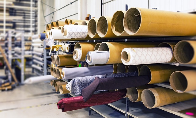 Rolls of fabric in a warehouse