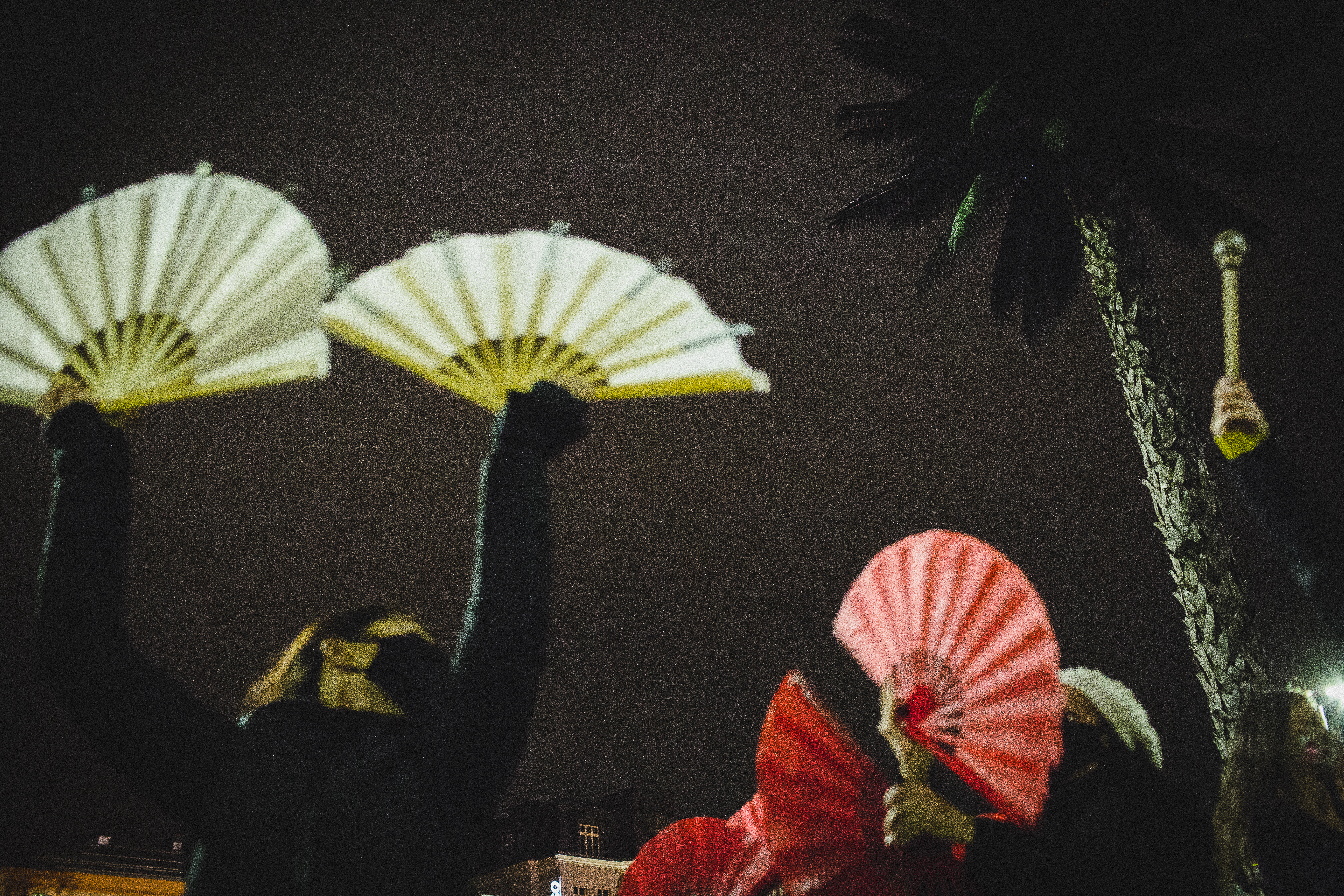 Protestors holding fans in the air at the Women’s Strike protests, Warsaw, Poland. October 2020.